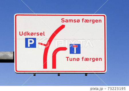 Panel and road sign to Samso island and Tuno island in Denmark 73223195