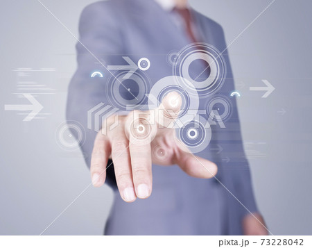 hand and finger of an asian businessman pressing virtual button hand and finger of an asian businessman pressing virtual button 73228042