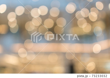 Bokeh lights in sepia tone background in department store shopping 73233032