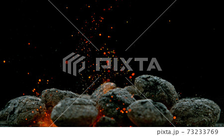 Charcoal briquettes ready for barbecue grill. Charcoal briquettes ready for barbecue grill. 73233769