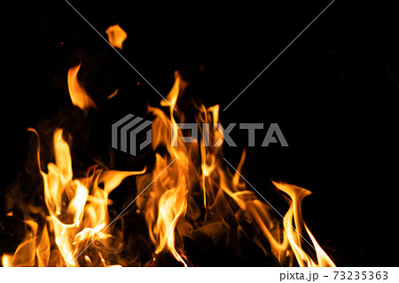 Fire flames on a black background. Abstract fiery texture. Realistic fire flames burn movement frame. Texture for Design. The texture of fire. Fire flames background. Blazing campfire. Sensitive Fire flames on a black background. Abstract fiery texture. Realistic fire flames burn movement frame. Texture for Design. The texture of fire. Fire flames background. Blazing campfire. Sensitive 73235363