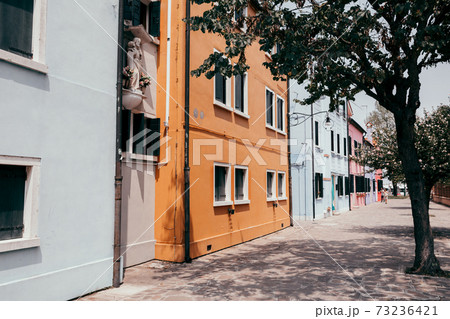 Panoramic view of brightly coloured homes of Burano Panoramic view of brightly coloured homes of Burano 73236421