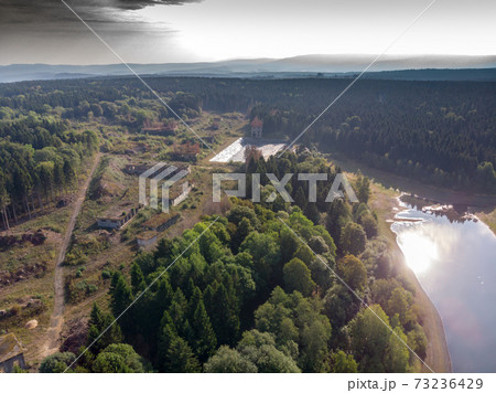 Aerial view of the ruins of an old industrial plant 73236429