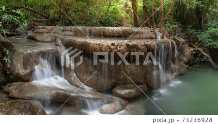 Beautiful waterfall at Erawan national park, Thailand. Panorama Beautiful waterfall at Erawan national park, Thailand. Panorama 73236928
