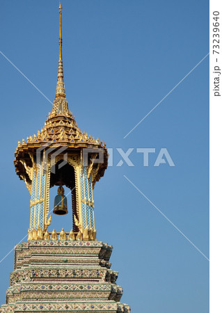 A small tower with a bell from the Temple of the Emerald Buddha. A small tower with a bell from the Temple of the Emerald Buddha. 73239640