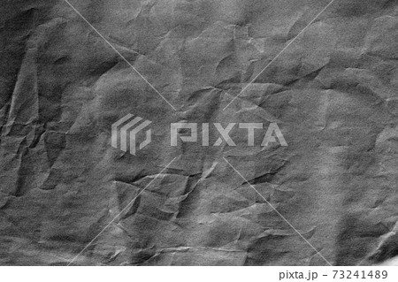 Dark grey crumpled background paper texture 73241489