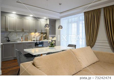 Luxury grey and white modern kitchen and living room Luxury grey and white modern kitchen and living room 73242474