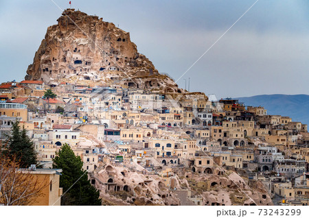 Landscape view of Uchisar, Cappadocia, Turkey under cloudy sky 73243299