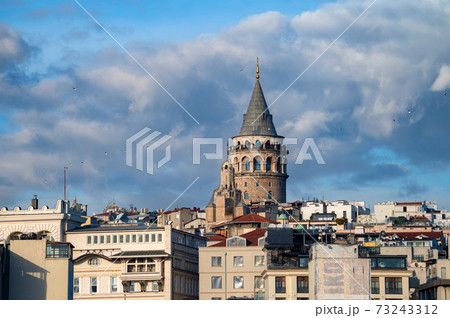 Landscape view on the Galata Tower under the blue autumn sky Landscape view on the Galata Tower under the blue autumn sky 73243312