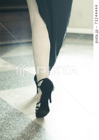 Legs of sexy woman tango dancer in pose Legs of sexy woman tango dancer in pose 73244444