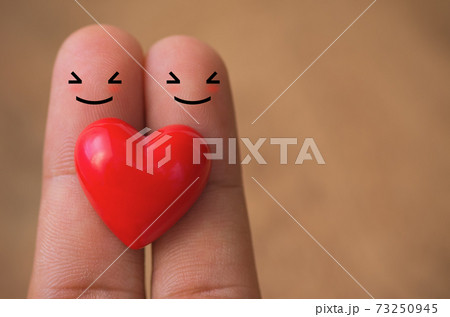 Hearts on finger. Hearts on finger. 73250945