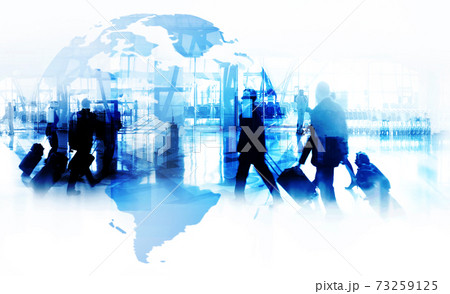 Silhouettes of business people walking  against a modern cityscape or airport . Toned image double exposure 73259125