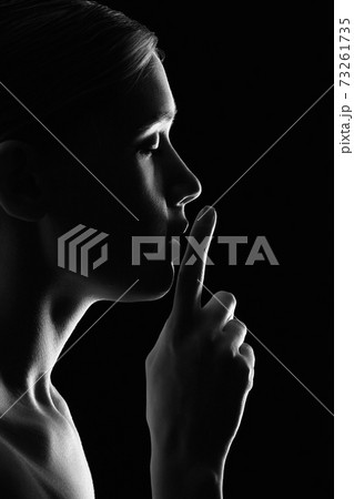 female silence gesture 73261735