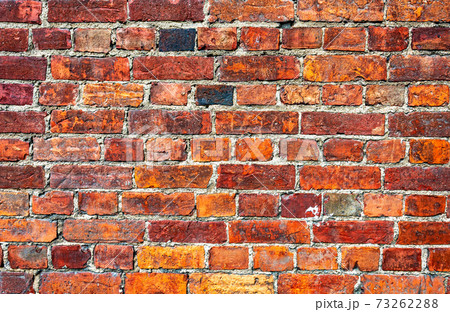 Old weathered red brick wall as background Old weathered red brick wall as background 73262288