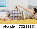 Woman wake up after relaxing 73266364