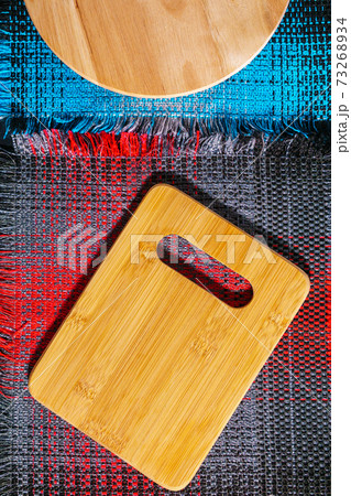 template wooden dish background on a black background. space for copying text. vertical photo template wooden dish background on a black background. space for copying text. vertical photo 73268934