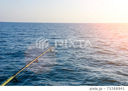 fishing on sea before sunset. fishing selective focus. copyspace 73268941