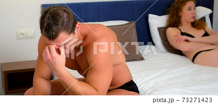 Young unhappy couple having problem in bedroom, quarrel between lovers. 73271423