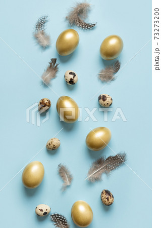 Easter vertical greeting card with golden eggs on blue background. Easter vertical greeting card with golden eggs on blue background. 73273200