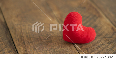 Accessories of decorations valentine's day holiday background concept.Essential item colorful red love couple shape on modern rustic brown wooden.blank space for mock up creative design. 73275342