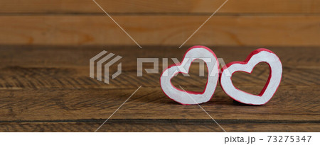 Accessories of decorations valentine's day holiday background concept.Essential item colorful red love couple shape on modern rustic brown wooden.blank space for mock up creative design. Accessories of decorations valentine's day holiday background concept.Essential item colorful red love couple shape on modern rustic brown wooden.blank space for mock up creative design. 73275347