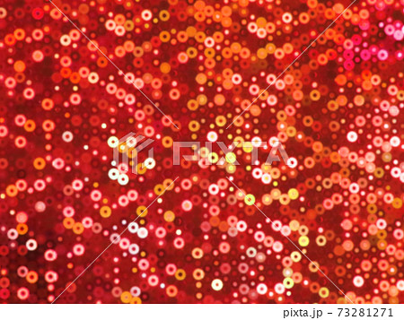 弾ける無数のスパンコールの光が降り注ぐ背景イメージ 赤 他色ありますのイラスト素材