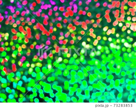 テーマパークのカラフルな緑黄赤桃グラデーションイルミネーション 背景イメージ 他系色ありますのイラスト素材