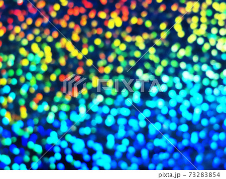 テーマパークのカラフルな緑青赤黄グラデーションイルミネーション 背景イメージ 他系色ありますのイラスト素材