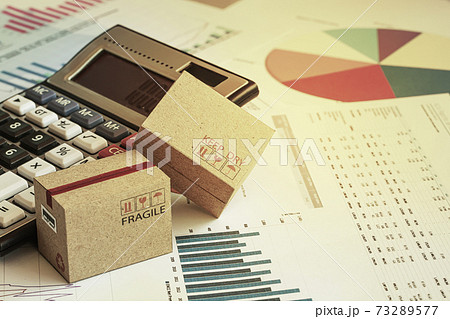 Packaging cardboard boxes with calculator and this type of financial charts include stacks of bar compare between the expansion of export business and increase the rate of goods each year. Packaging cardboard boxes with calculator and this type of financial charts include stacks of bar compare between the expansion of export business and increase the rate of goods each year. 73289577