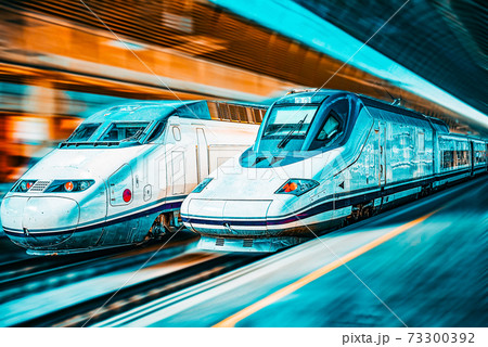 Modern hi-speed passenger train, in  movement (motion). 73300392