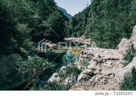 Landscape of green mountains in sadernes, catalonia Landscape of green mountains in sadernes, catalonia 73305207