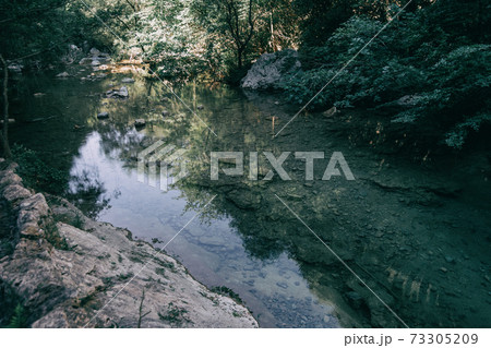 Landscape of green mountains in sadernes, catalonia Landscape of green mountains in sadernes, catalonia 73305209