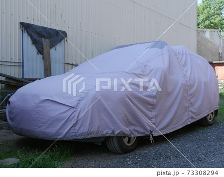 car covered with a cover car covered with a cover 73308294