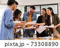Interracial business team meeting smile and brainstorm 73308890
