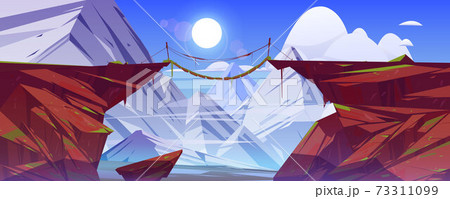 Bridge between mountains hang above cliff gap 73311099