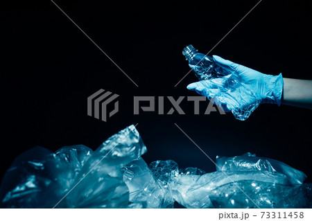 waste management plastic recycling volunteer hand waste management plastic recycling volunteer hand 73311458
