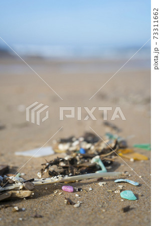 Plastic waste and micro plastic washed on the shore of the atlantic ocean Plastic waste and micro plastic washed on the shore of the atlantic ocean 73311662