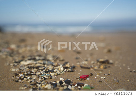 Plastic waste and micro plastic washed on the shore of the atlantic ocean 73311672