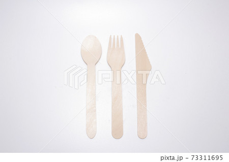 a set of Wooden spoon, knife and fork a set of Wooden spoon, knife and fork 73311695