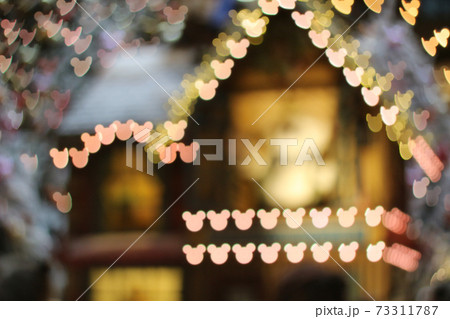 Festive bokeh lights on blue Christmas Decorations 9 Dec 2020 73311787