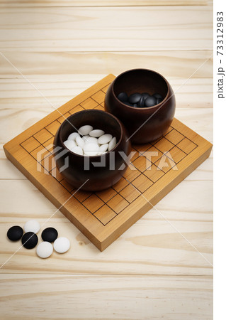 Go Game, Goban, Baduk or Weiqi (Chinese Board Game) Background Go Game, Goban, Baduk or Weiqi (Chinese Board Game) Background 73312983