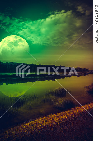 Night sky and super moon at riverside. Serenity nature background. 73313940