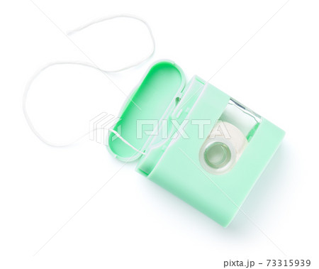 Dental Floss In Green Box Isolated Dental Floss In Green Box Isolated 73315939