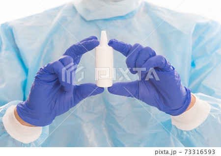 Vaccine against covid-19. Medicine container in gloves. Selective focus. Vaccine development. Vaccine against covid-19. Medicine container in gloves. Selective focus. Vaccine development. 73316593
