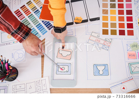 Designers working and designing a user interface Designers working and designing a user interface 73316666