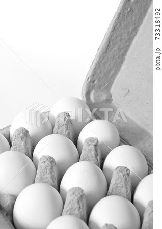 Fresh organic white chicken eggs, on a bamboo cutting board Fresh organic white chicken eggs, on a bamboo cutting board 73318492