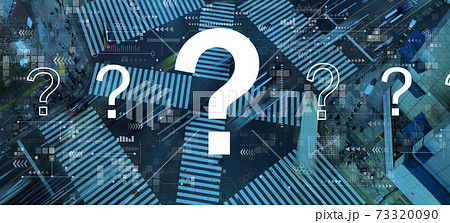 Question marks with city traffic intersection 73320090