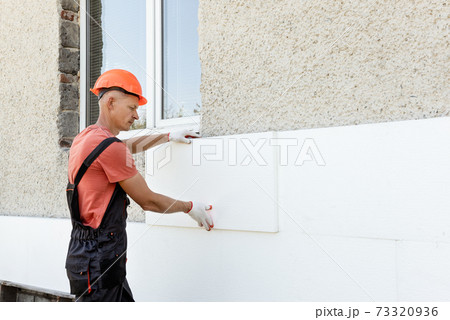 Insulation of the house with polyfoam. 73320936