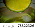 Lime in a glass of water. 73322326