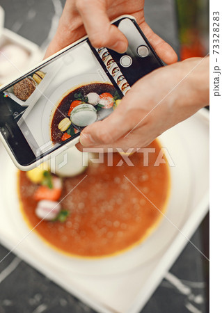 Photograph a macaroons with smartphone camera Photograph a macaroons with smartphone camera 73328283